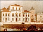 Imagem do Rio de Janeiro, a capital e principal centro urbano do pas em 1808. A imagem pode ser utilizada para exemplificar historicamente o perodo literrio compreendido pelas ltimas produes do movimento rcade, considerado, tambm, um momento de transio na literatura brasileira, com mudanas de foco artstico e cultural da Bahia para o Rio de Janeiro, capital da colnia desde o ano de 1763. <br /><br /> Palavras-chave: Rio de Janeiro. Costumes de poca. Literatura. Arcadismo. 